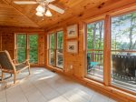 Medley Sunset Cove - Sunroom with stunning floor to ceiling lake views